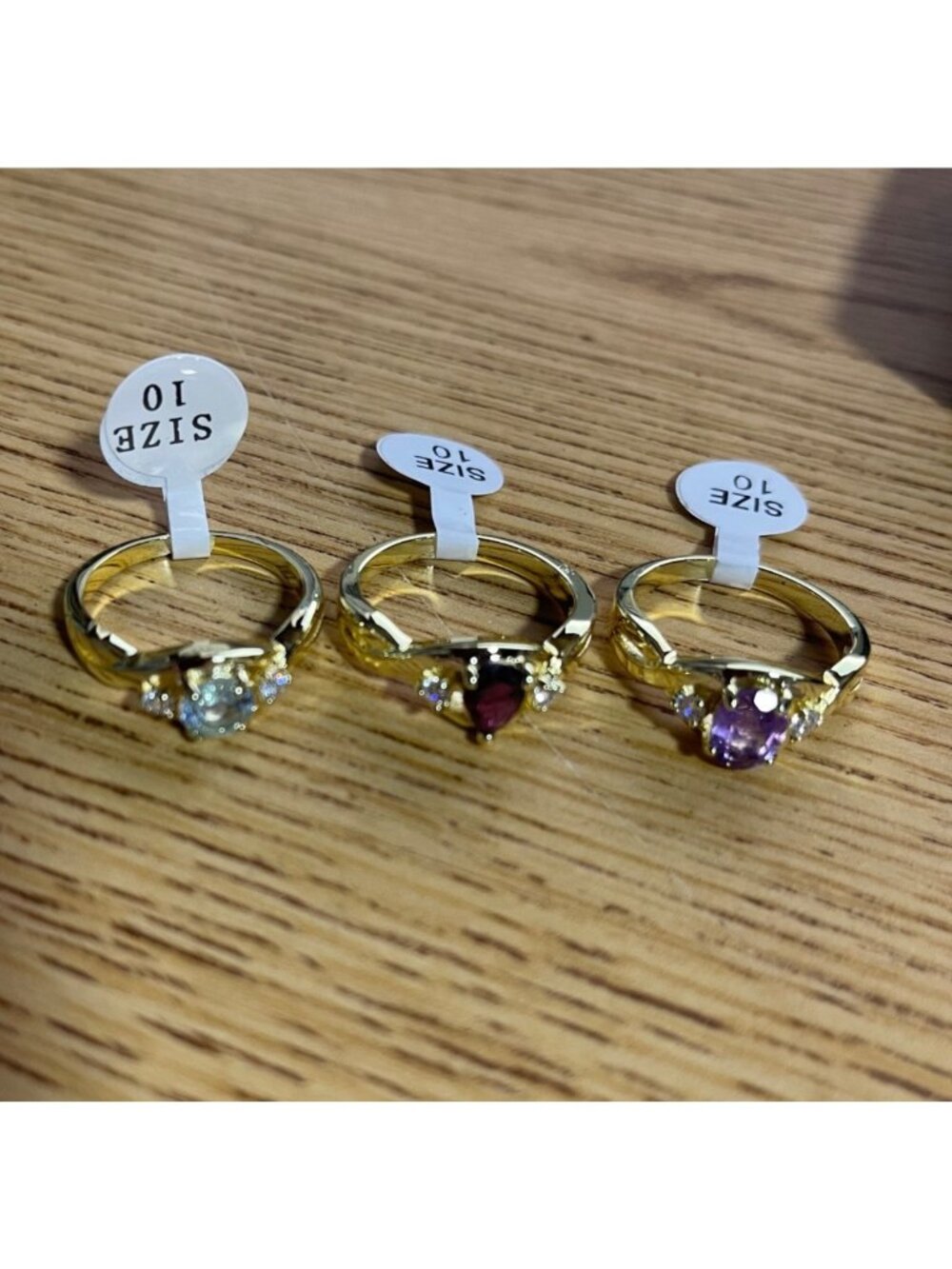 Set of 3 Gold Tone Rings Light Blue Red Purple Simulated Gemstones Size 10